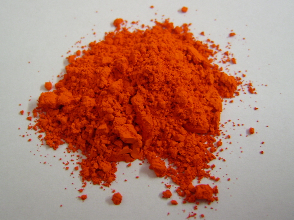 Pigmento minio en polvo — color rojo-anaranjado característico
