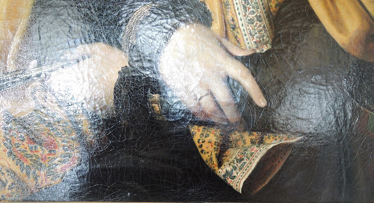 Craquelado en pintura sobre lienzo causado por tensiones del soporte