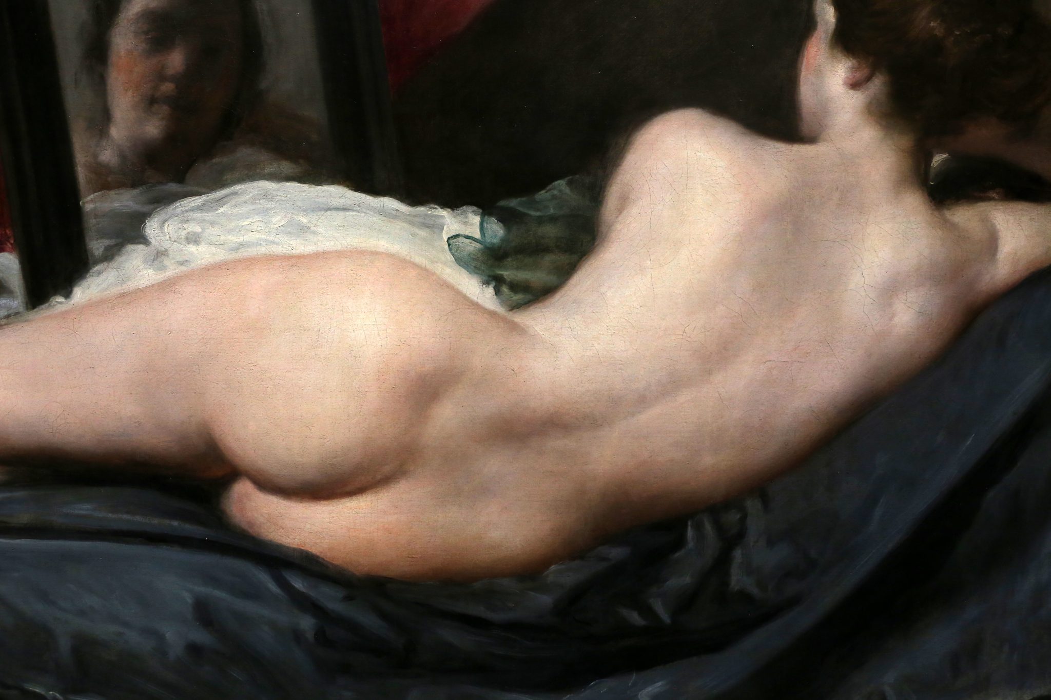 La Venus del espejo — detalle del rostro reflejado en el espejo